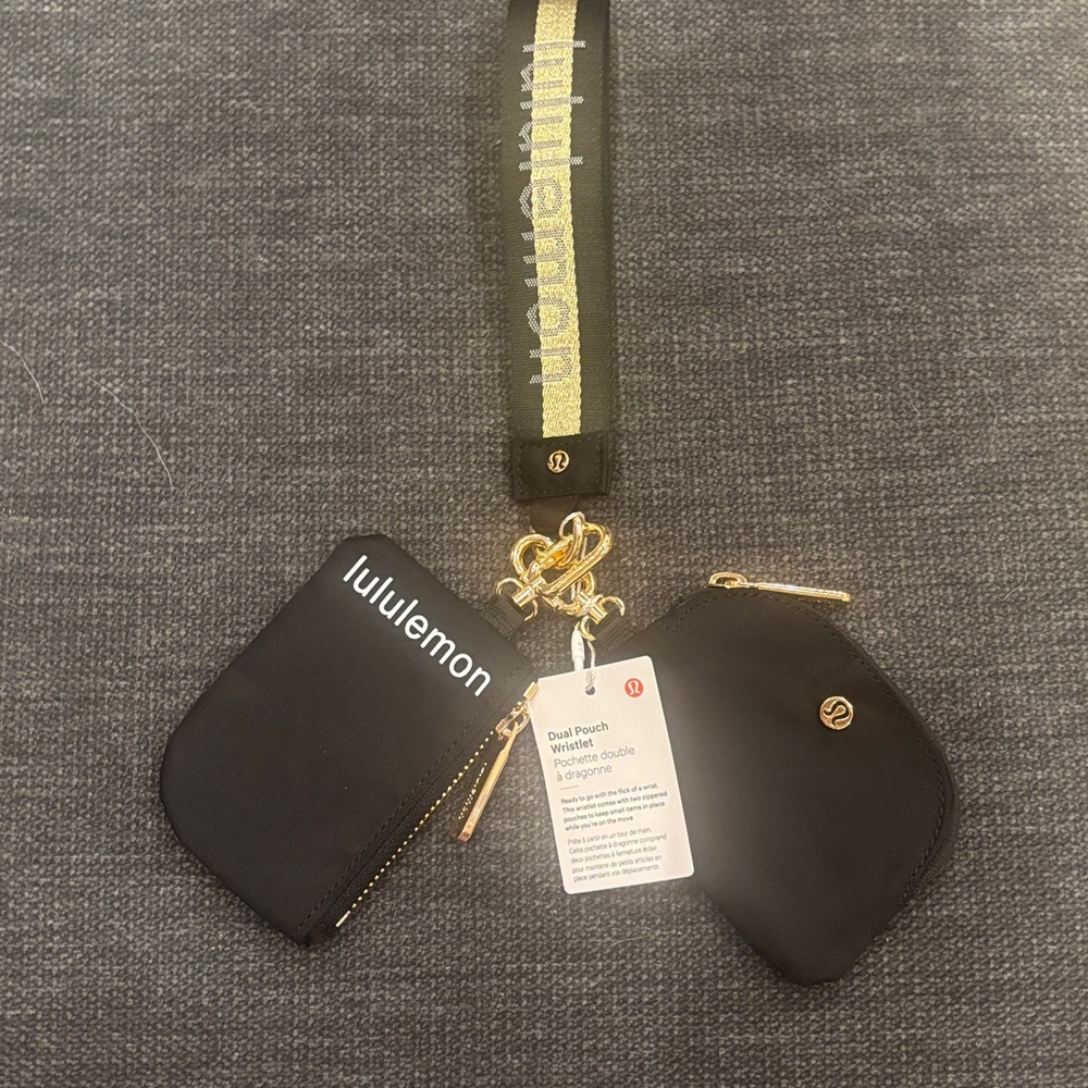 Lululemon Black and Gold Dual Pouch Wristlet Brand New Set